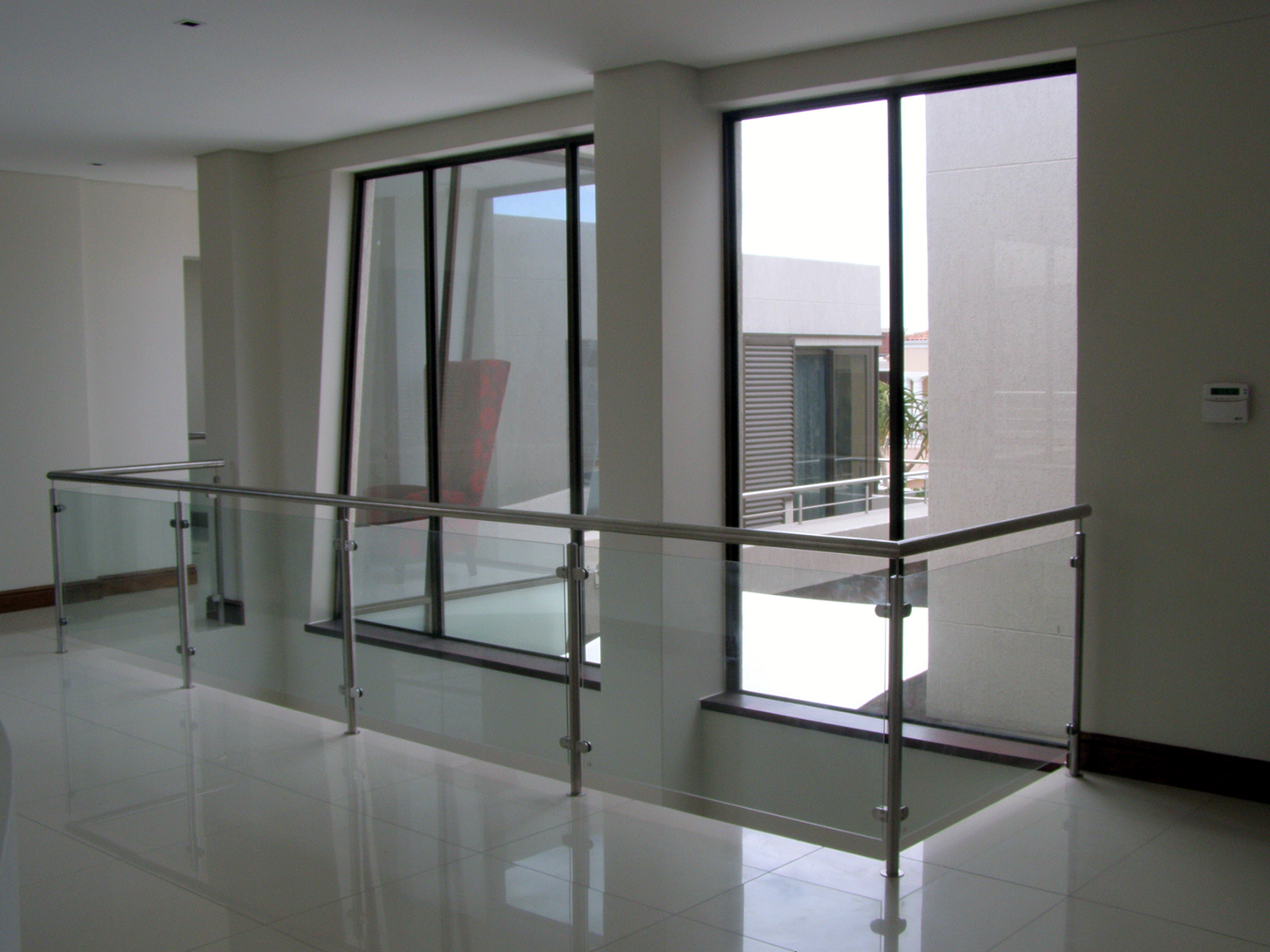 Glass Balustrades with Stainless Steel Frame and Handrail.